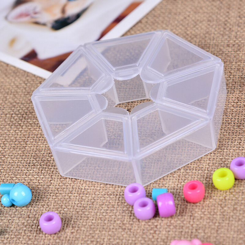 The new hot-selling seven-cell pill box mini portable storage box is divided into a circle